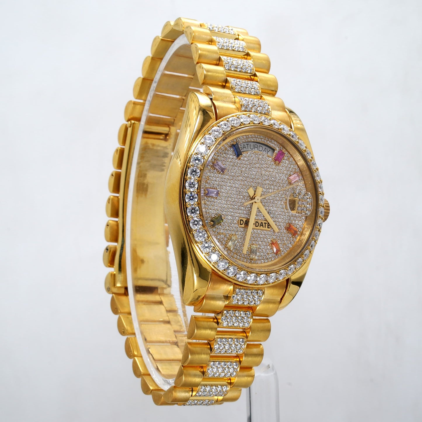Yellow gold rollie with mutlicolor dial