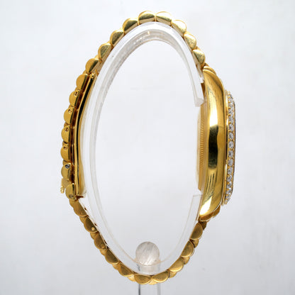 Yellow gold rollie with mutlicolor dial